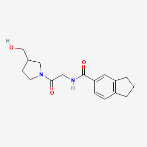 molecular formula C17H22N2O3 B6637309 N-[2-[3-(hydroxymethyl)pyrrolidin-1-yl]-2-oxoethyl]-2,3-dihydro-1H-indene-5-carboxamide 