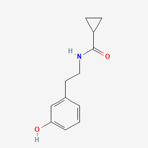 molecular formula C12H15NO2 B6638787 N-[2-(3-hydroxyphenyl)ethyl]cyclopropanecarboxamide 