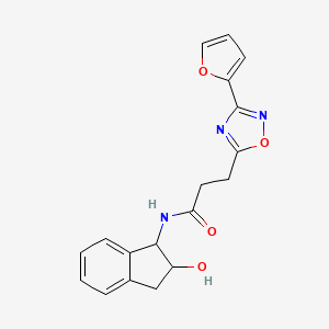molecular formula C18H17N3O4 B6640608 3-[3-(furan-2-yl)-1,2,4-oxadiazol-5-yl]-N-(2-hydroxy-2,3-dihydro-1H-inden-1-yl)propanamide 