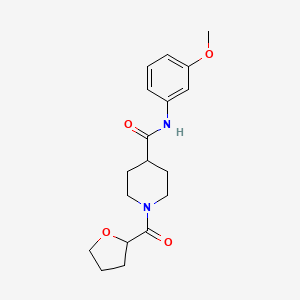 molecular formula C18H24N2O4 B6643137 N-(3-methoxyphenyl)-1-(oxolane-2-carbonyl)piperidine-4-carboxamide 