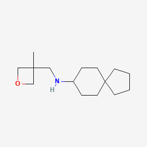 molecular formula C15H27NO B6645735 N-[(3-methyloxetan-3-yl)methyl]spiro[4.5]decan-8-amine 