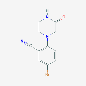 molecular formula C11H10BrN3O B6647563 5-Bromo-2-(3-oxopiperazin-1-yl)benzonitrile 