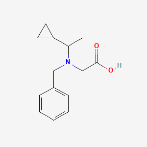 molecular formula C14H19NO2 B6651334 Acetic acid, benzyl(1-cyclopropylethyl)amine 