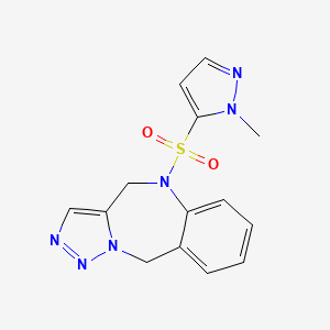 molecular formula C14H14N6O2S B6747982 5-(2-Methylpyrazol-3-yl)sulfonyl-4,10-dihydrotriazolo[5,1-c][1,4]benzodiazepine 