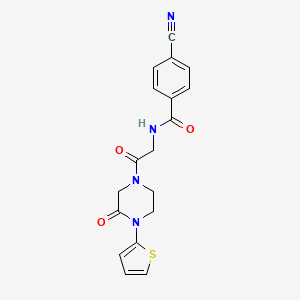 molecular formula C18H16N4O3S B6748235 4-cyano-N-[2-oxo-2-(3-oxo-4-thiophen-2-ylpiperazin-1-yl)ethyl]benzamide 