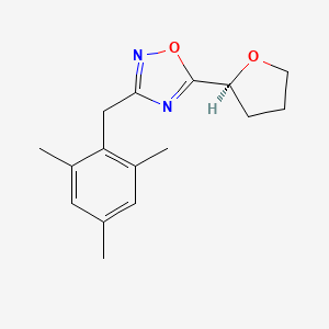 5-[(2S)-oxolan-2-yl]-3-[(2,4,6-trimethylphenyl)methyl]-1,2,4-oxadiazole