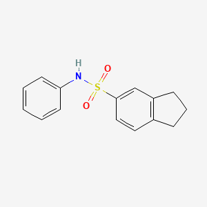 molecular formula C15H15NO2S B6748405 N-phenyl-2,3-dihydro-1H-indene-5-sulfonamide 