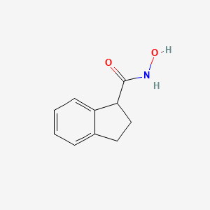 molecular formula C10H11NO2 B6749116 N-hydroxy-2,3-dihydro-1H-indene-1-carboxamide 