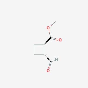 molecular formula C7H10O3 B6749249 rac-methyl(1R,2R)-2-formylcyclobutane-1-carboxylate 