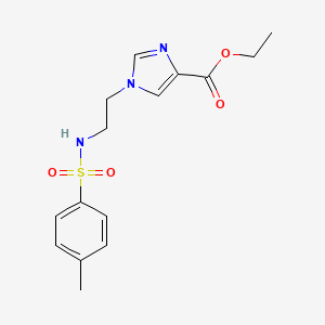 molecular formula C15H19N3O4S B6749832 Ethyl 1-[2-[(4-methylphenyl)sulfonylamino]ethyl]imidazole-4-carboxylate 