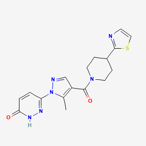 molecular formula C17H18N6O2S B6751684 3-[5-methyl-4-[4-(1,3-thiazol-2-yl)piperidine-1-carbonyl]pyrazol-1-yl]-1H-pyridazin-6-one 