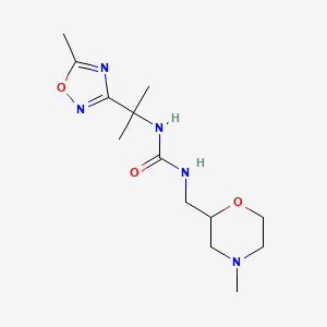 molecular formula C13H23N5O3 B6752033 1-[(4-Methylmorpholin-2-yl)methyl]-3-[2-(5-methyl-1,2,4-oxadiazol-3-yl)propan-2-yl]urea 