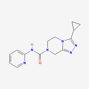 molecular formula C14H16N6O B6752482 3-cyclopropyl-N-pyridin-2-yl-6,8-dihydro-5H-[1,2,4]triazolo[4,3-a]pyrazine-7-carboxamide 