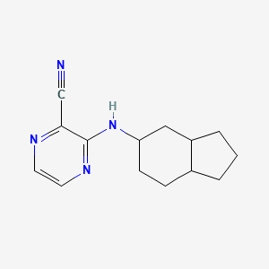 molecular formula C14H18N4 B6754129 3-(2,3,3a,4,5,6,7,7a-octahydro-1H-inden-5-ylamino)pyrazine-2-carbonitrile 