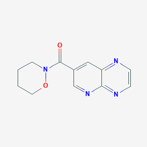 molecular formula C12H12N4O2 B6771694 Oxazinan-2-yl(pyrido[2,3-b]pyrazin-7-yl)methanone 