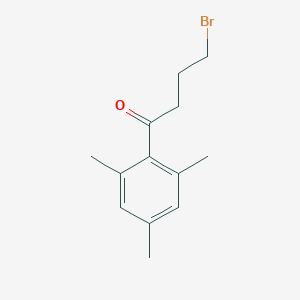B067851 4-Bromo-1-(2,4,6-trimethylphenyl)butan-1-one CAS No. 175204-92-9