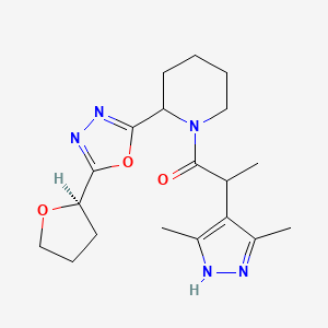 2-(3,5-dimethyl-1H-pyrazol-4-yl)-1-[2-[5-[(2R)-oxolan-2-yl]-1,3,4-oxadiazol-2-yl]piperidin-1-yl]propan-1-one