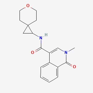 2-methyl-N-(6-oxaspiro[2.5]octan-2-yl)-1-oxoisoquinoline-4-carboxamide