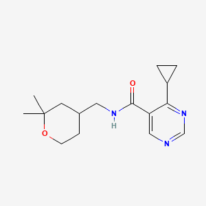 4-cyclopropyl-N-[(2,2-dimethyloxan-4-yl)methyl]pyrimidine-5-carboxamide