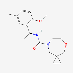 N-[(1R)-1-(2-methoxy-5-methylphenyl)ethyl]-5-oxa-8-azaspiro[2.6]nonane-8-carboxamide