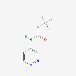 molecular formula C9H13N3O2 B068642 4-(Boc-氨基)吡啶嗪 CAS No. 169050-21-9
