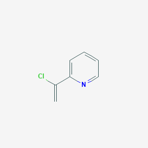 molecular formula C7H6ClN B068728 2-(1-Chlorovinyl)pyridine CAS No. 179418-20-3