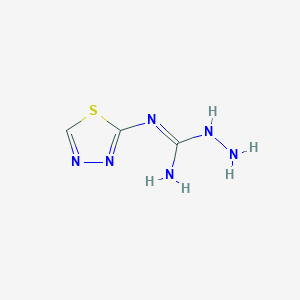molecular formula C3H6N6S B068762 N-(1,3,4-Thiadiazol-2-yl)hydrazinecarboximidamide CAS No. 161155-97-1