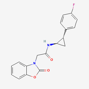 N-[(1R,2S)-2-(4-fluorophenyl)cyclopropyl]-2-(2-oxo-1,3-benzoxazol-3-yl)acetamide