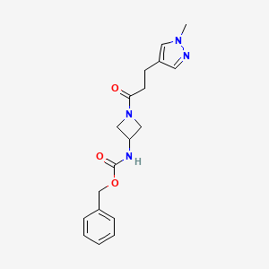 molecular formula C18H22N4O3 B6969245 benzyl N-[1-[3-(1-methylpyrazol-4-yl)propanoyl]azetidin-3-yl]carbamate 