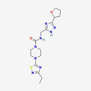 4-(3-ethyl-1,2,4-thiadiazol-5-yl)-N-[[3-(oxolan-2-yl)-1H-1,2,4-triazol-5-yl]methyl]piperazine-1-carboxamide