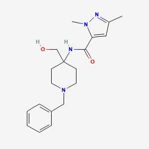 molecular formula C19H26N4O2 B6982630 N-[1-benzyl-4-(hydroxymethyl)piperidin-4-yl]-2,5-dimethylpyrazole-3-carboxamide 