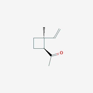 molecular formula C9H14O B069989 1-[(1S,2S)-2-Ethenyl-2-methylcyclobutyl]ethanone CAS No. 173829-76-0