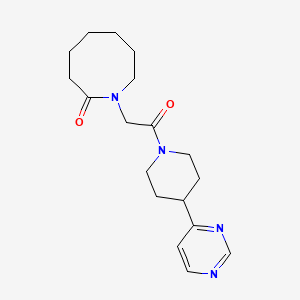 1-[2-Oxo-2-(4-pyrimidin-4-ylpiperidin-1-yl)ethyl]azocan-2-one