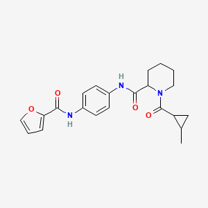 molecular formula C22H25N3O4 B7050467 N-[4-(furan-2-carbonylamino)phenyl]-1-(2-methylcyclopropanecarbonyl)piperidine-2-carboxamide 