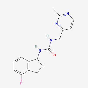 1-(4-fluoro-2,3-dihydro-1H-inden-1-yl)-3-[(2-methylpyrimidin-4-yl)methyl]urea