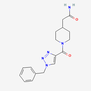 molecular formula C17H21N5O2 B7052611 2-[1-(1-Benzyltriazole-4-carbonyl)piperidin-4-yl]acetamide 