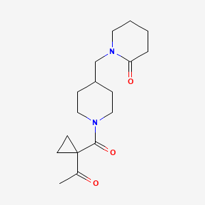 molecular formula C17H26N2O3 B7053554 1-[[1-(1-Acetylcyclopropanecarbonyl)piperidin-4-yl]methyl]piperidin-2-one 