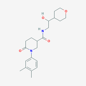 1-(3,4-dimethylphenyl)-N-[2-hydroxy-2-(oxan-4-yl)ethyl]-6-oxopiperidine-3-carboxamide