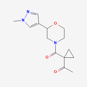 molecular formula C14H19N3O3 B7054559 1-[1-[2-(1-Methylpyrazol-4-yl)morpholine-4-carbonyl]cyclopropyl]ethanone 