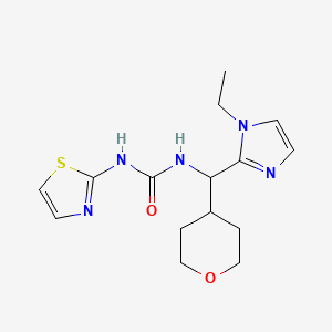 molecular formula C15H21N5O2S B7055178 1-[(1-Ethylimidazol-2-yl)-(oxan-4-yl)methyl]-3-(1,3-thiazol-2-yl)urea 