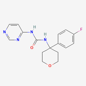 1-[4-(4-Fluorophenyl)oxan-4-yl]-3-pyrimidin-4-ylurea