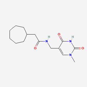 2-cycloheptyl-N-[(1-methyl-2,4-dioxopyrimidin-5-yl)methyl]acetamide