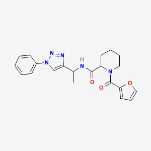 1-(furan-2-carbonyl)-N-[1-(1-phenyltriazol-4-yl)ethyl]piperidine-2-carboxamide