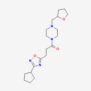 3-(3-Cyclopentyl-1,2,4-oxadiazol-5-yl)-1-[4-(oxolan-2-ylmethyl)piperazin-1-yl]propan-1-one