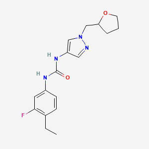 1-(4-Ethyl-3-fluorophenyl)-3-[1-(oxolan-2-ylmethyl)pyrazol-4-yl]urea