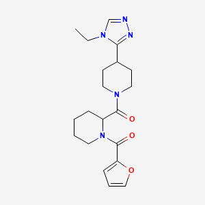 [4-(4-Ethyl-1,2,4-triazol-3-yl)piperidin-1-yl]-[1-(furan-2-carbonyl)piperidin-2-yl]methanone