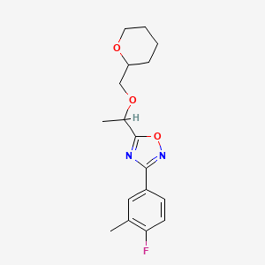 3-(4-Fluoro-3-methylphenyl)-5-[1-(oxan-2-ylmethoxy)ethyl]-1,2,4-oxadiazole