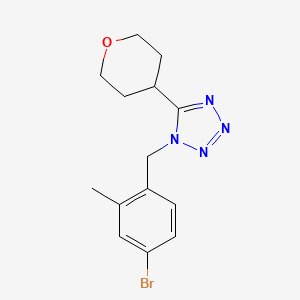 1-[(4-Bromo-2-methylphenyl)methyl]-5-(oxan-4-yl)tetrazole