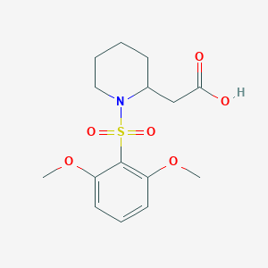 molecular formula C15H21NO6S B7245609 2-[1-(2,6-Dimethoxyphenyl)sulfonylpiperidin-2-yl]acetic acid 