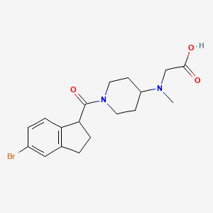 molecular formula C18H23BrN2O3 B7246208 2-[[1-(5-bromo-2,3-dihydro-1H-indene-1-carbonyl)piperidin-4-yl]-methylamino]acetic acid 